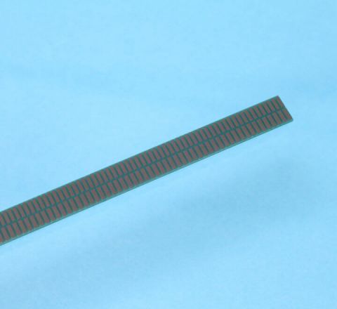 Dual-track absolute linear scale for POSIC's AP- encoders. The two tracks form a Nonius-scale with absolute stroke 9.6 mm. Side view
