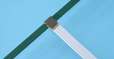 Induktiv Linear-Encoder bestehend aus einem Sensor-Kopf und einem Massstab