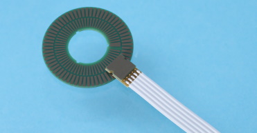 Rotary inductive encoder kit consisting of an inductive position sensor and a codewheel