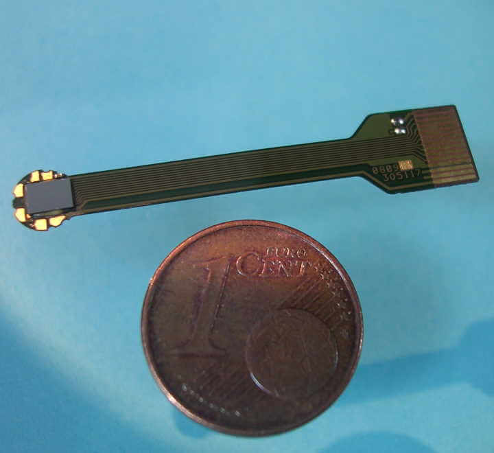 Custom encoder mounted on a flex-carrier